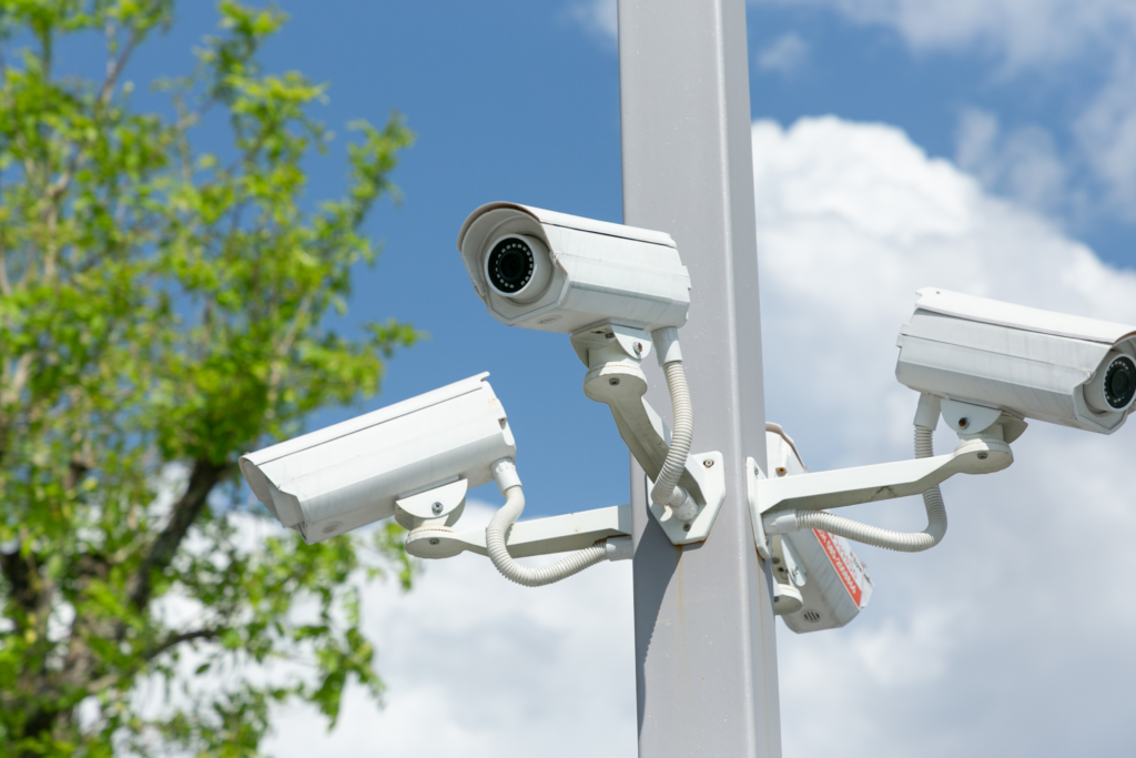 Three mounted security cameras