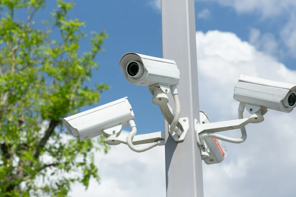 Three mounted security cameras