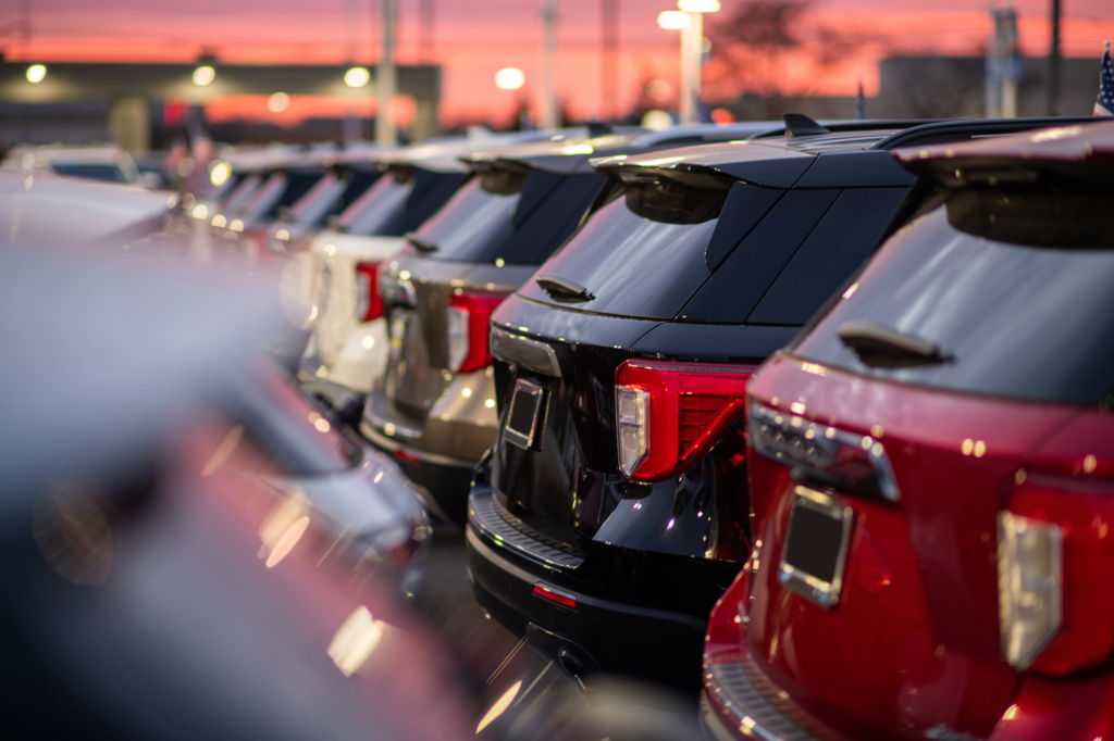 SUVs lined up in a parking lot