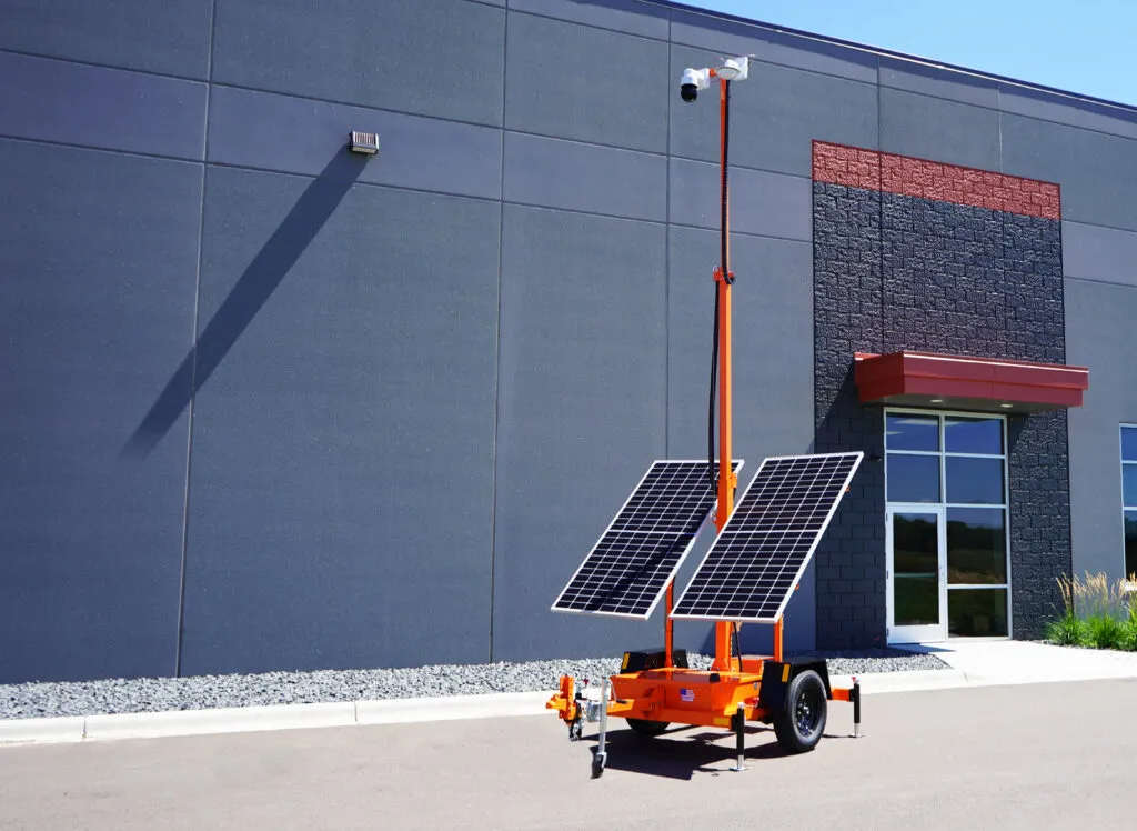 mobile surveillance trailer in front of building